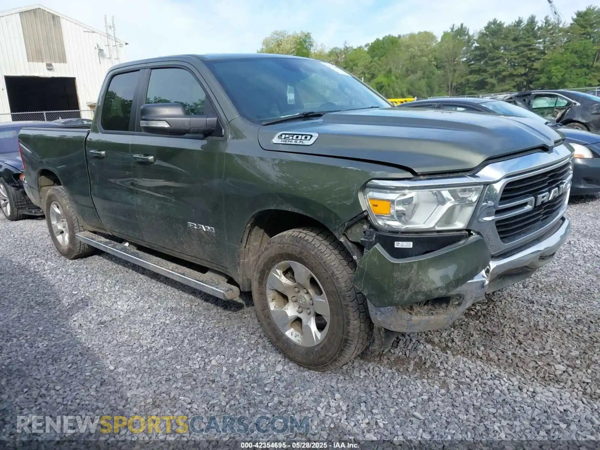 1 Photograph of a damaged car 1C6SRFBT1MN720707 RAM 1500 2021