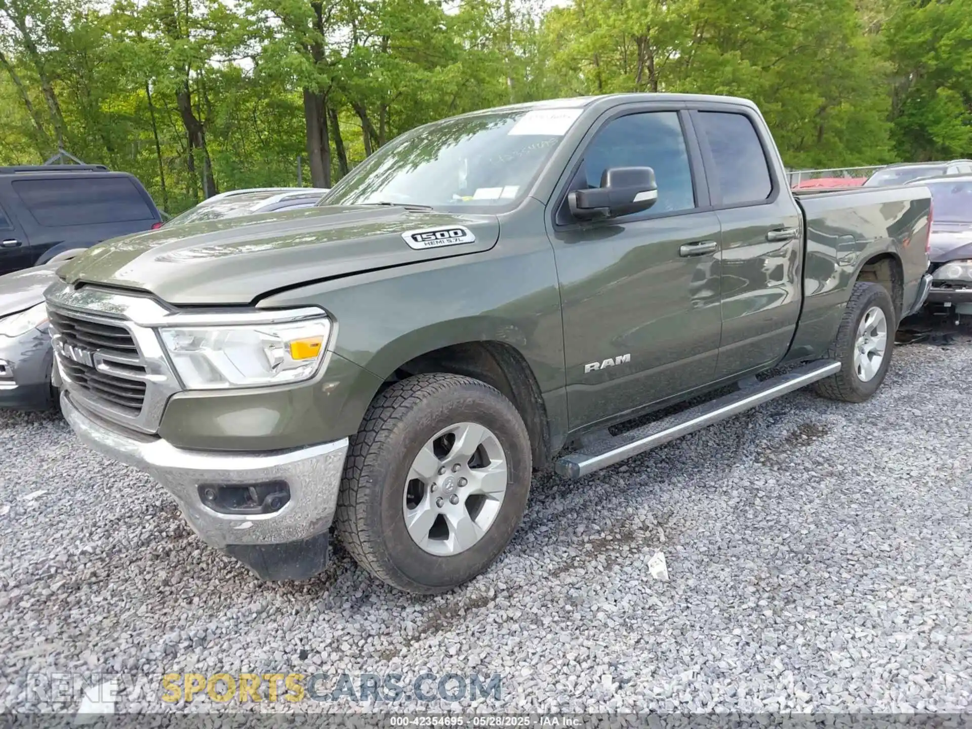 2 Photograph of a damaged car 1C6SRFBT1MN720707 RAM 1500 2021