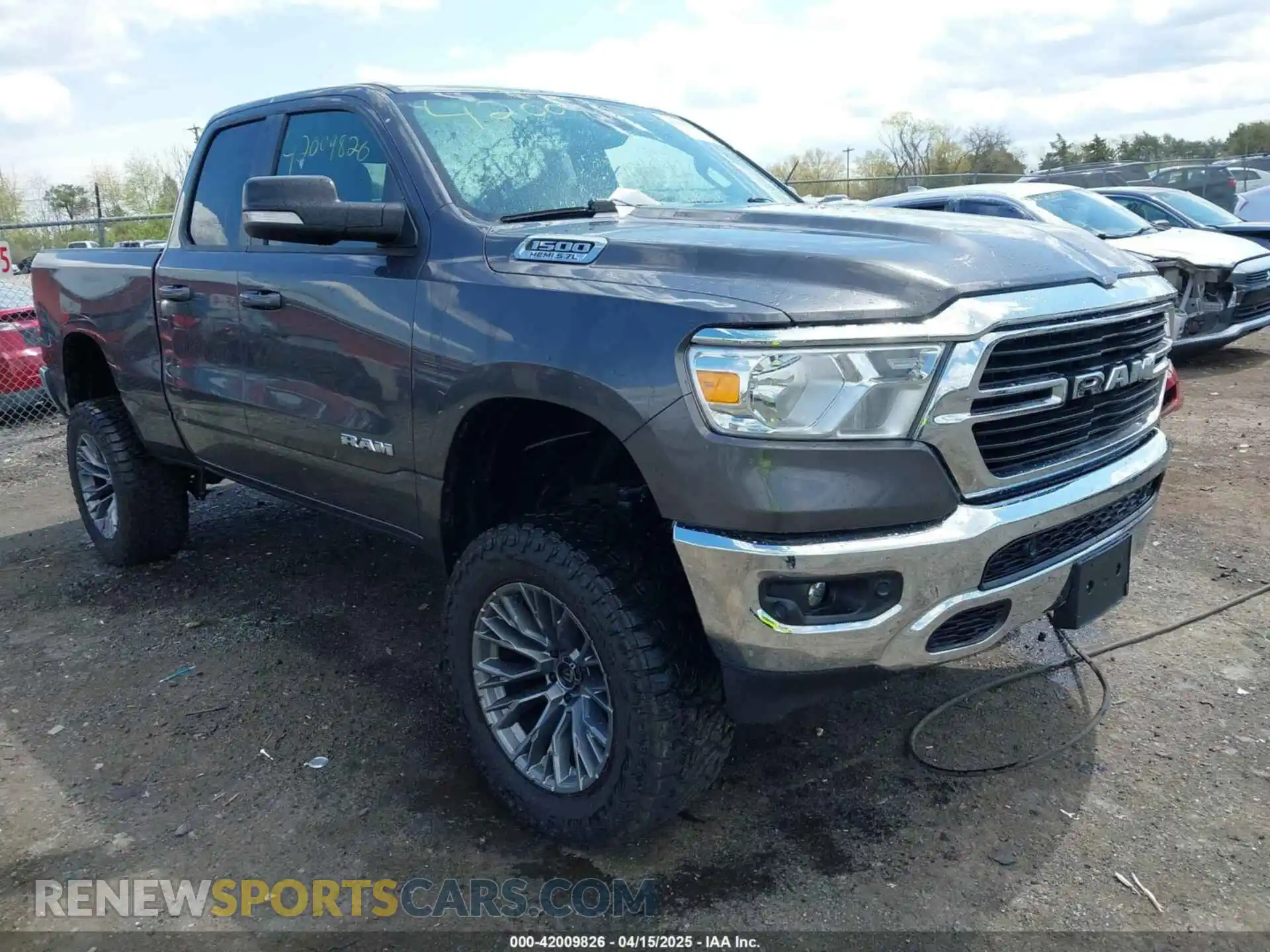 1 Photograph of a damaged car 1C6SRFBT2MN732087 RAM 1500 2021