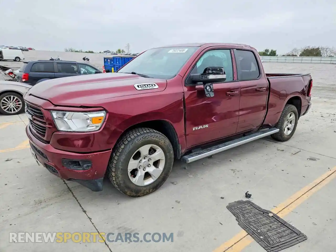 1 Photograph of a damaged car 1C6SRFBT4MN612937 RAM 1500 2021