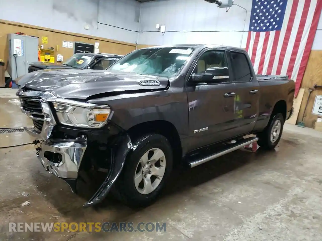 1 Photograph of a damaged car 1C6SRFBT4MN696449 RAM 1500 2021