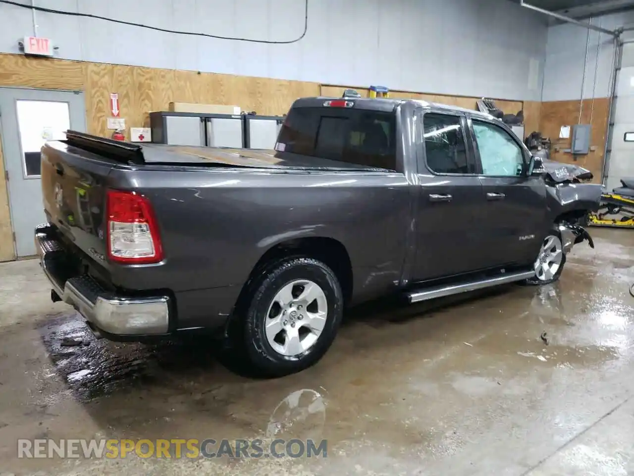3 Photograph of a damaged car 1C6SRFBT4MN696449 RAM 1500 2021