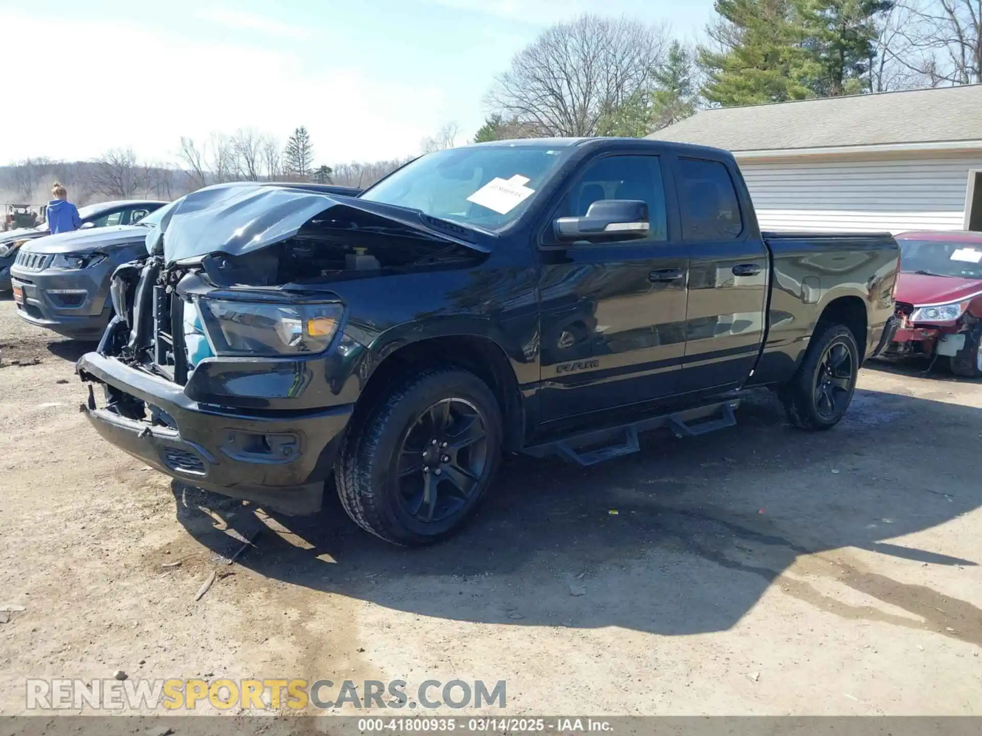 2 Photograph of a damaged car 1C6SRFBT4MN814080 RAM 1500 2021