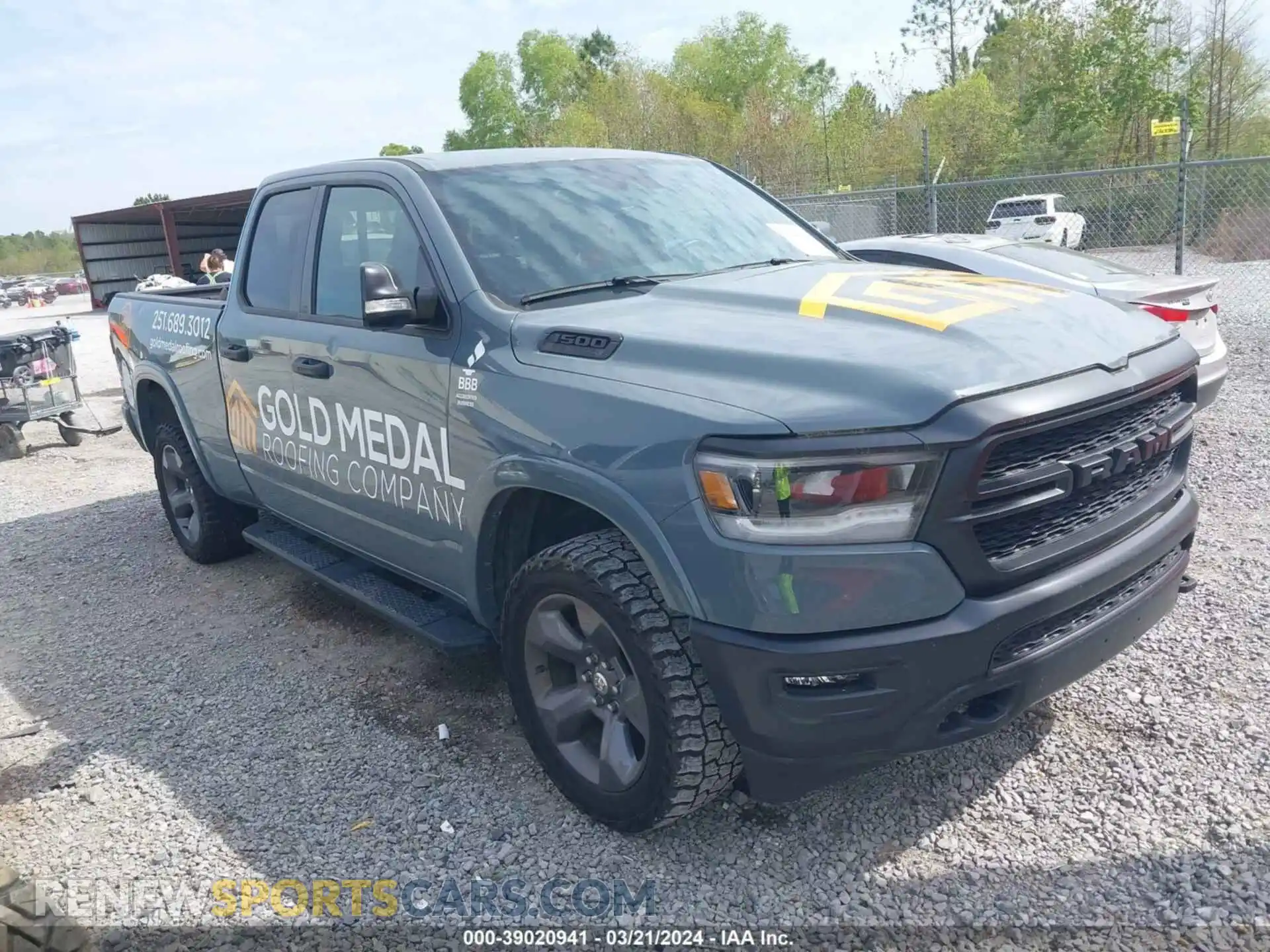 1 Photograph of a damaged car 1C6SRFBT6MN561862 RAM 1500 2021