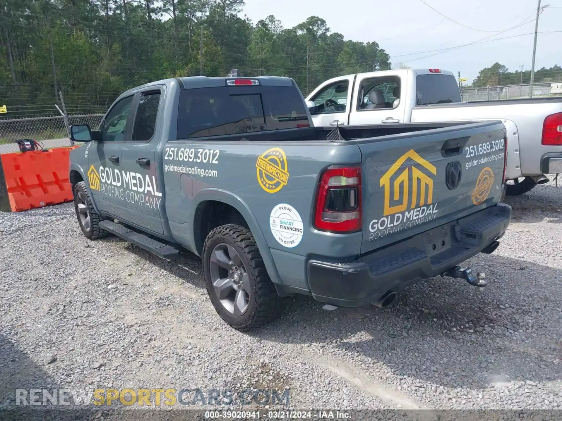 3 Photograph of a damaged car 1C6SRFBT6MN561862 RAM 1500 2021