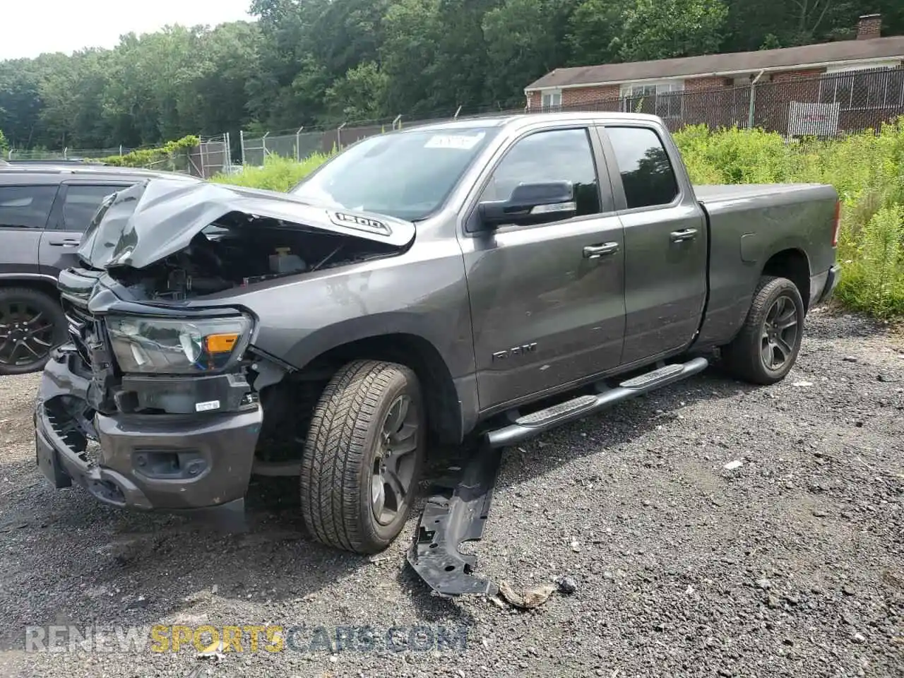 1 Photograph of a damaged car 1C6SRFBT6MN620585 RAM 1500 2021