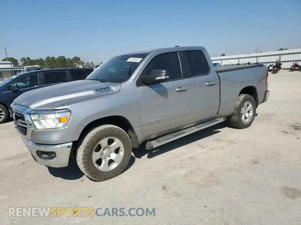 1 Photograph of a damaged car 1C6SRFBT6MN784791 RAM 1500 2021