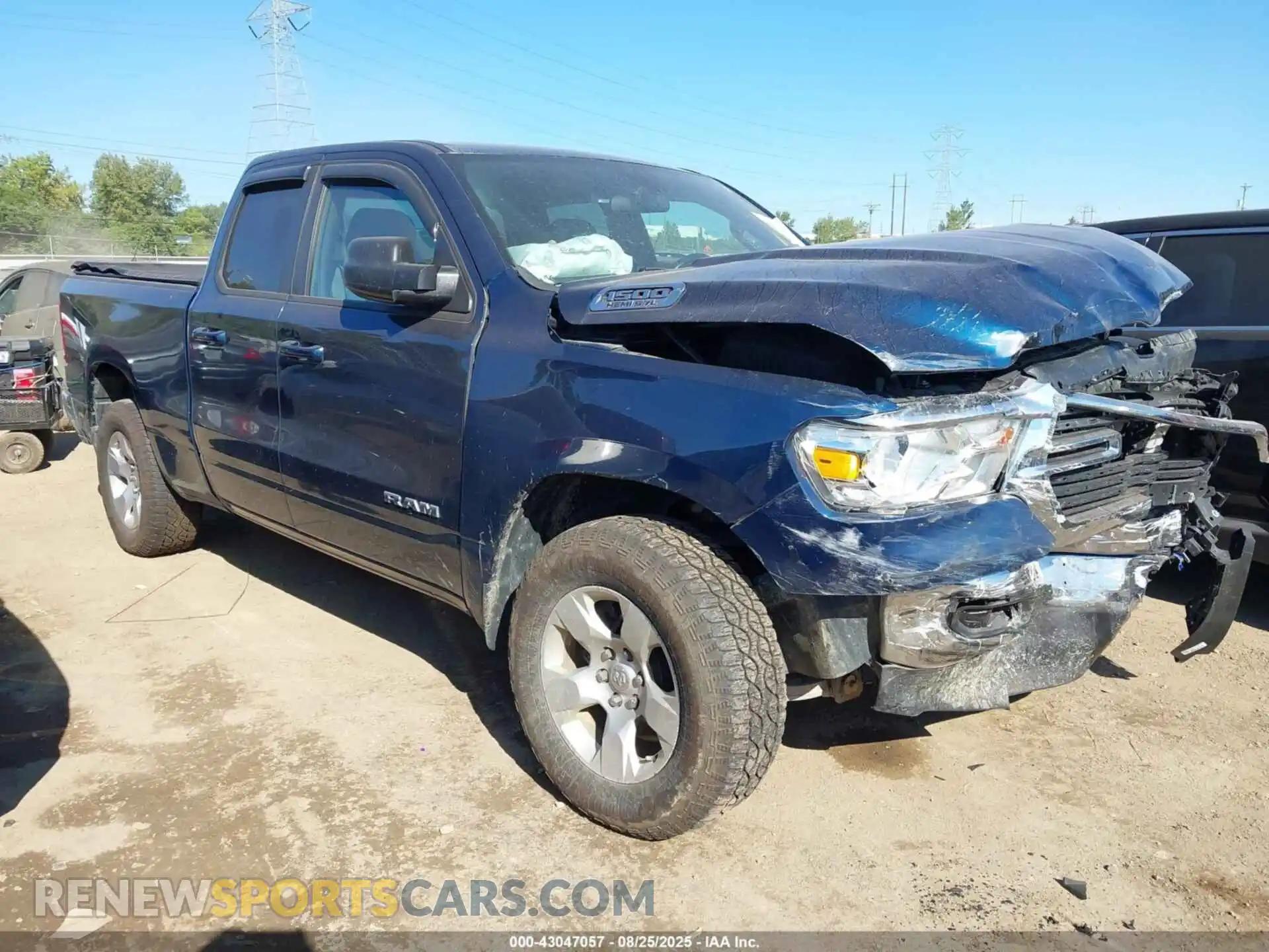 1 Photograph of a damaged car 1C6SRFBT7MN779812 RAM 1500 2021
