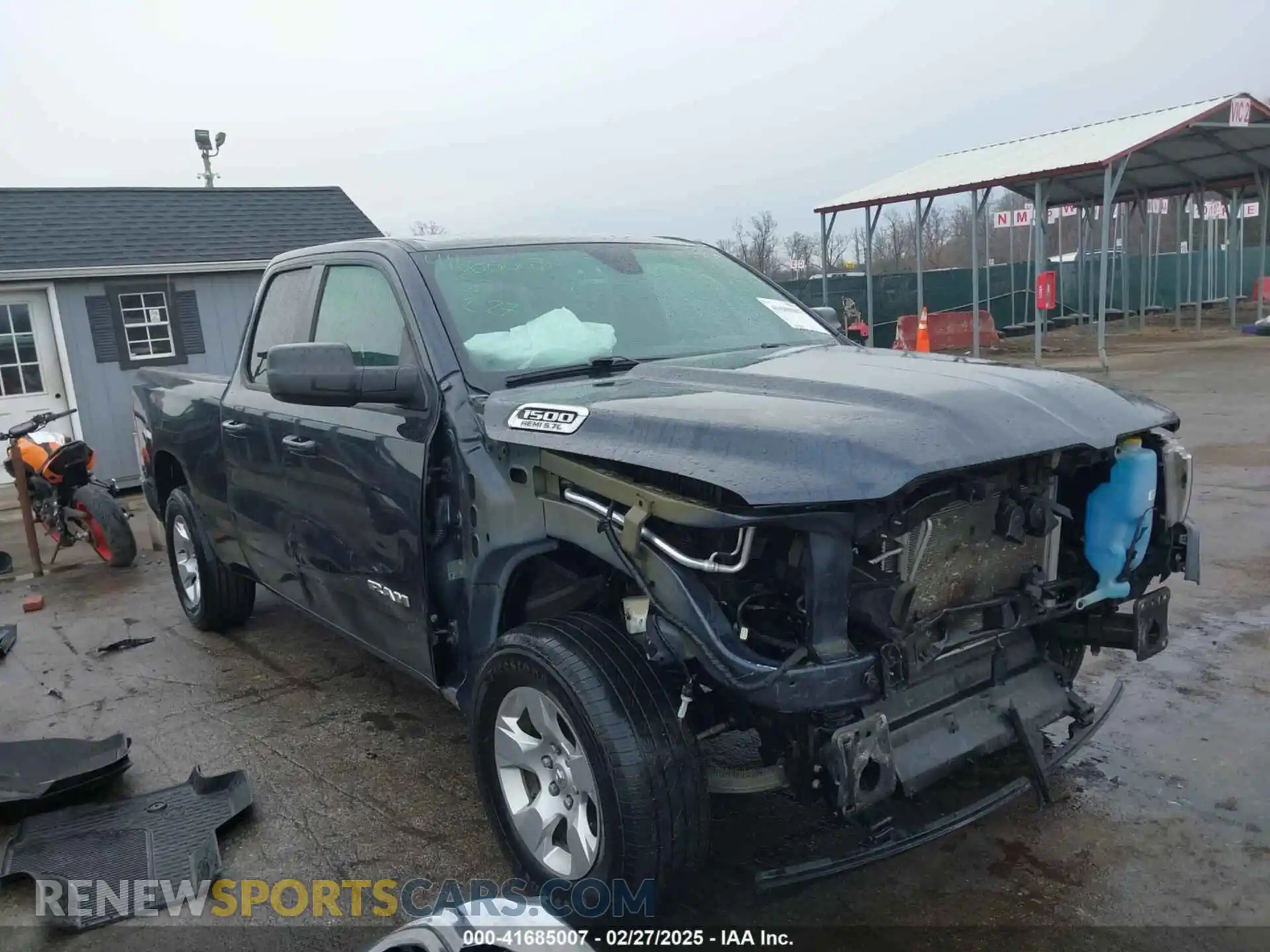 1 Photograph of a damaged car 1C6SRFBT9MN559538 RAM 1500 2021
