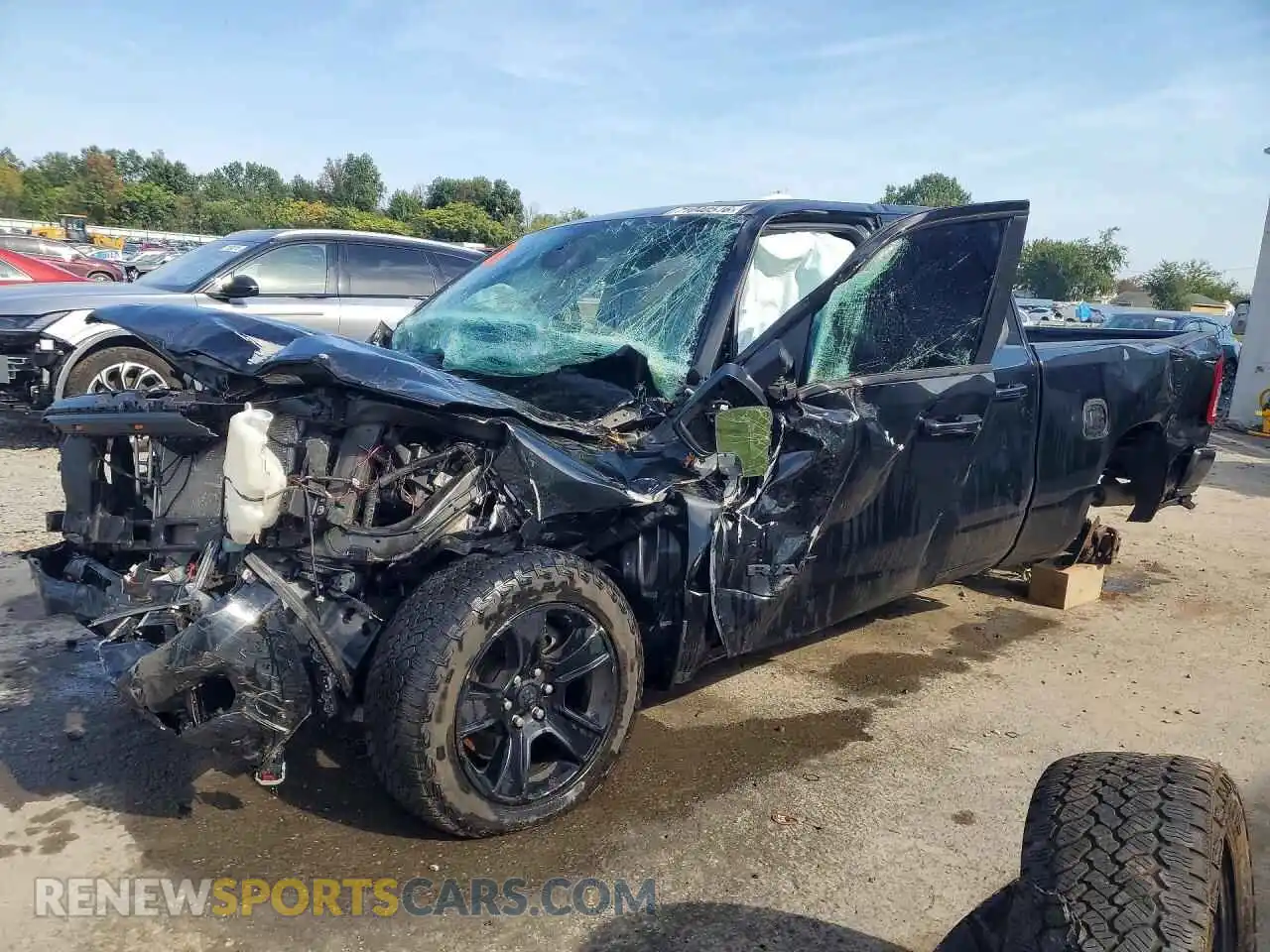 1 Photograph of a damaged car 1C6SRFBT9MN669781 RAM 1500 2021