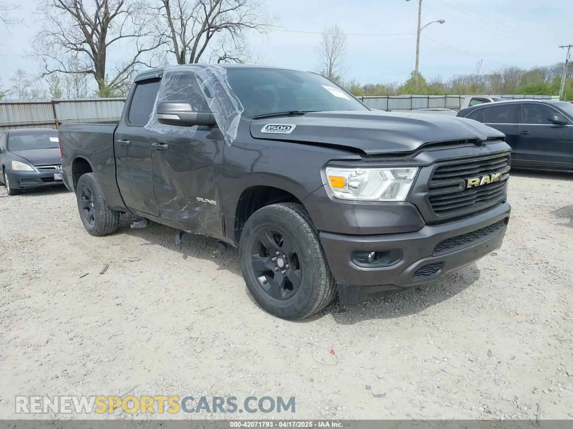 1 Photograph of a damaged car 1C6SRFBT9MN806038 RAM 1500 2021