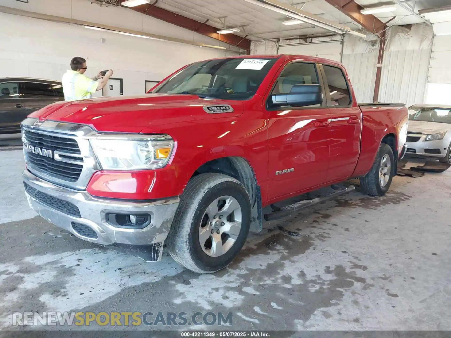 2 Photograph of a damaged car 1C6SRFBTXMN572461 RAM 1500 2021