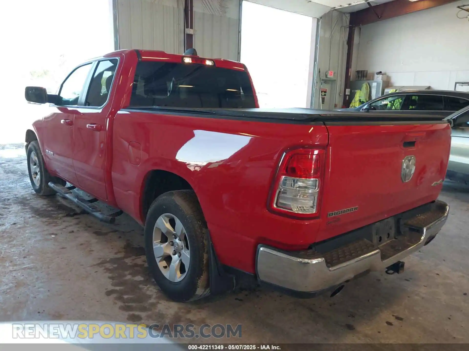 3 Photograph of a damaged car 1C6SRFBTXMN572461 RAM 1500 2021