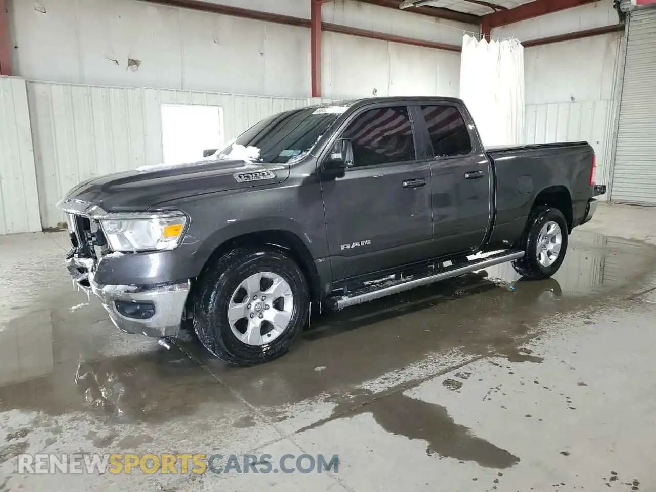 1 Photograph of a damaged car 1C6SRFBTXMN572525 RAM 1500 2021