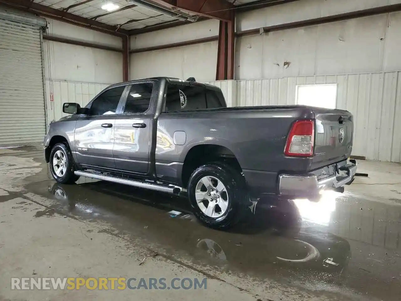 2 Photograph of a damaged car 1C6SRFBTXMN572525 RAM 1500 2021