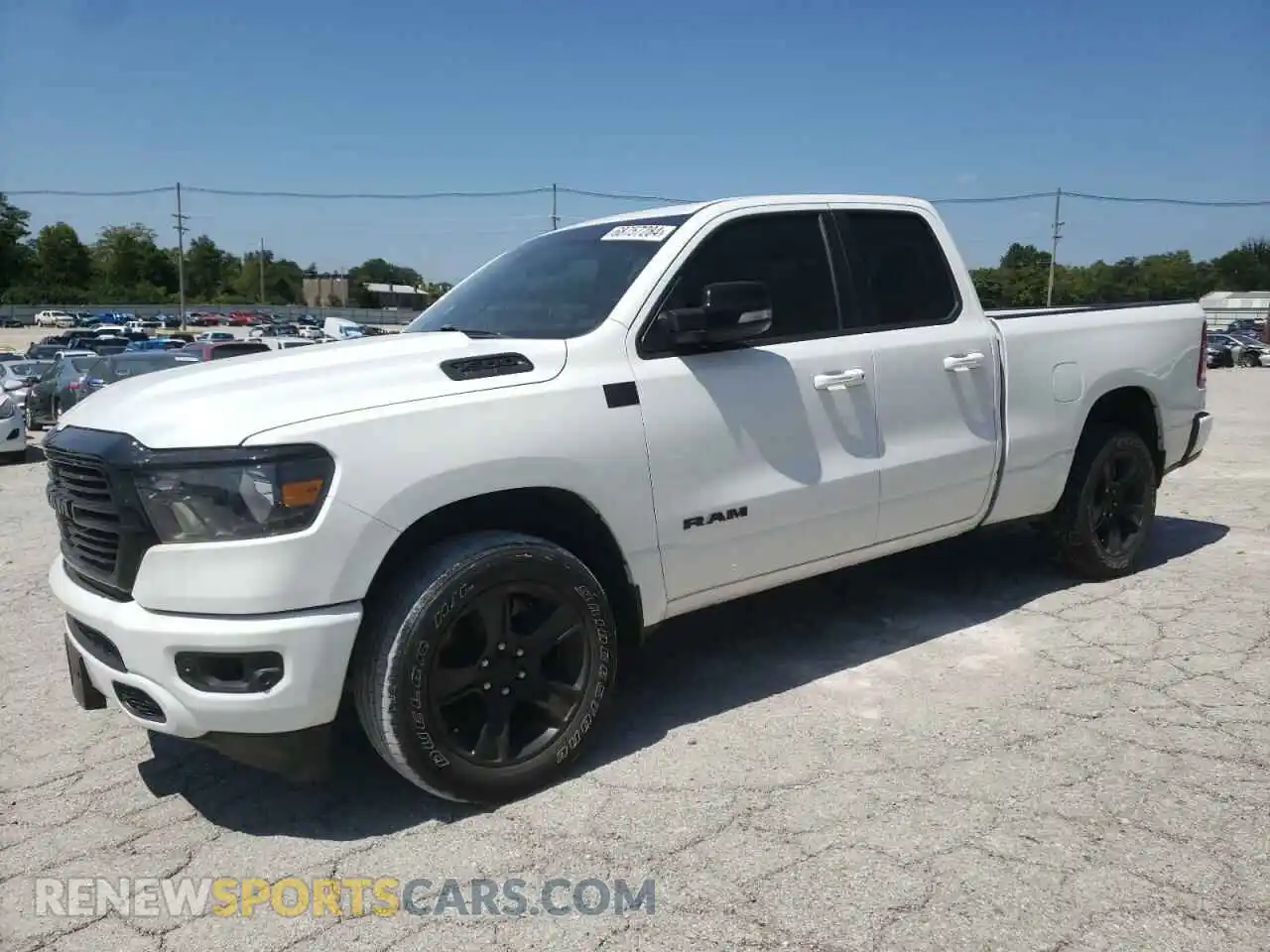1 Photograph of a damaged car 1C6SRFBTXMN683091 RAM 1500 2021