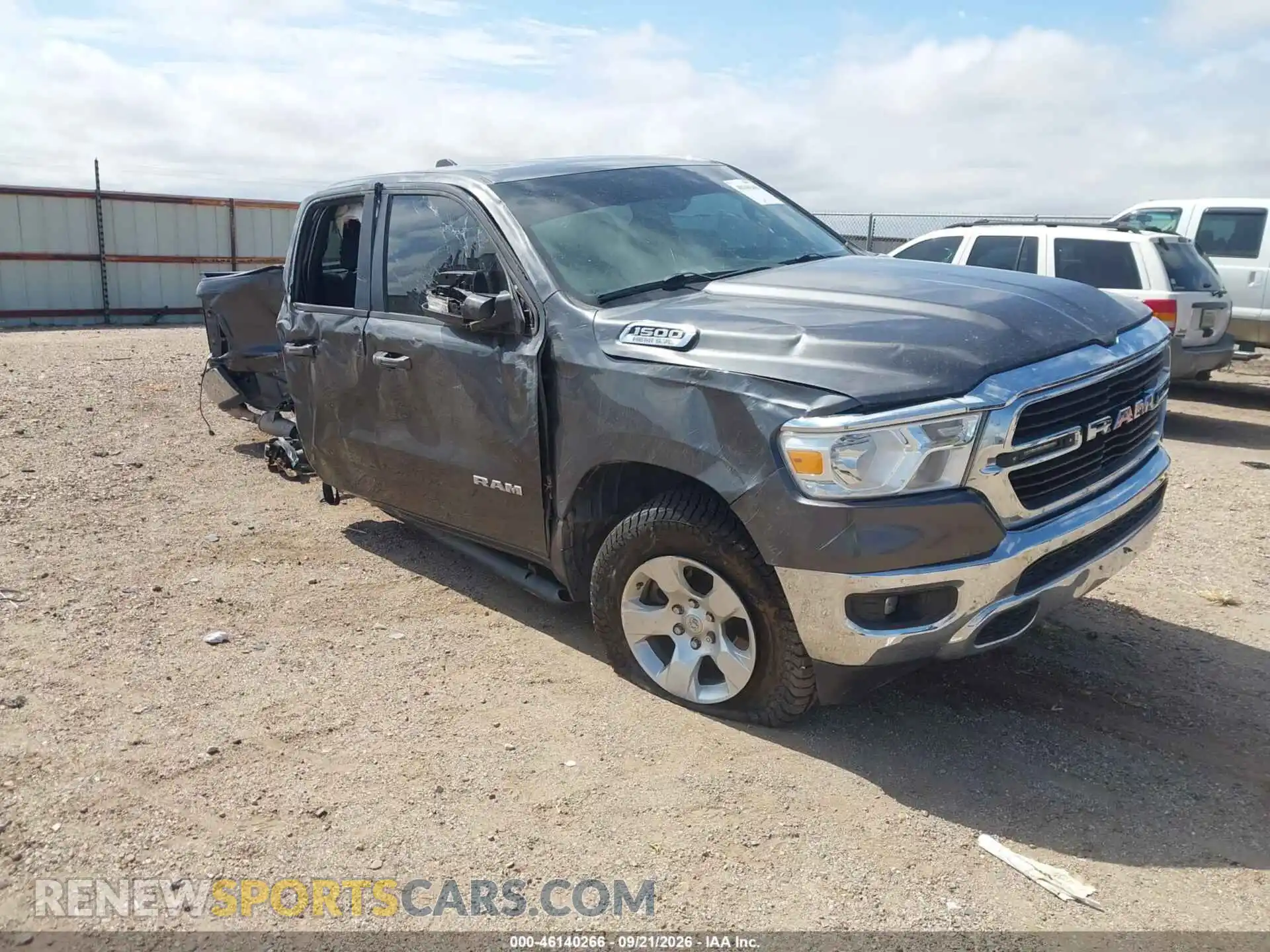 1 Photograph of a damaged car 1C6SRFBTXMN762213 RAM 1500 2021