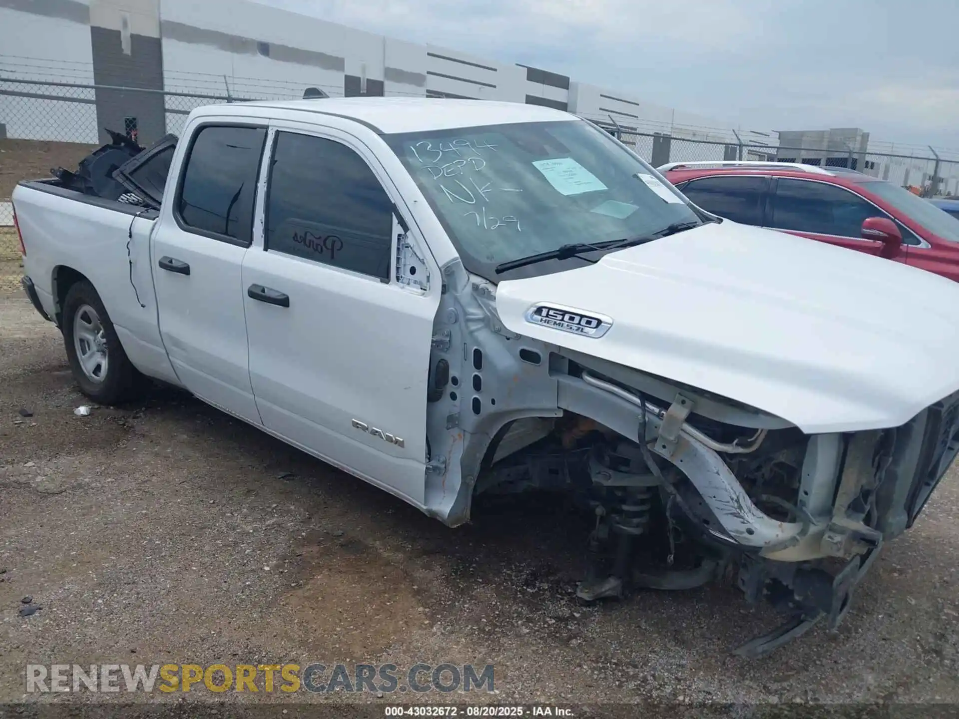 1 Photograph of a damaged car 1C6SRFCTXMN515952 RAM 1500 2021