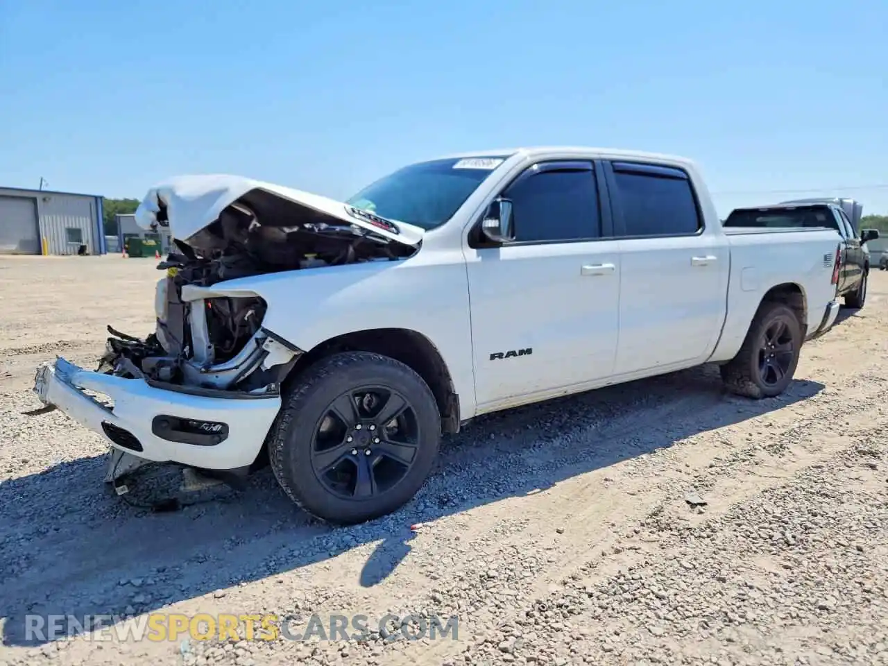 1 Photograph of a damaged car 1C6SRFFM2MN739916 RAM 1500 2021