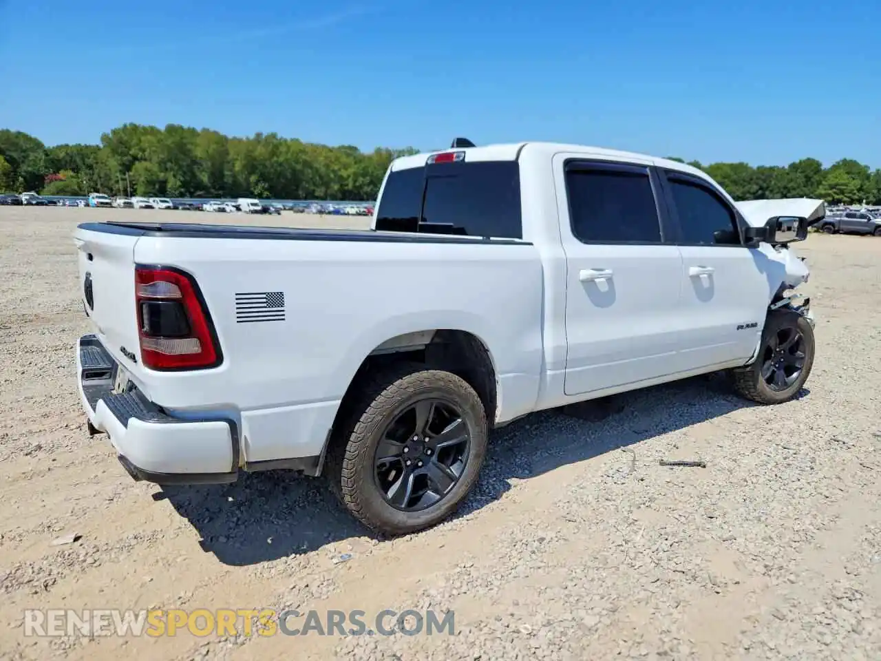 3 Photograph of a damaged car 1C6SRFFM2MN739916 RAM 1500 2021