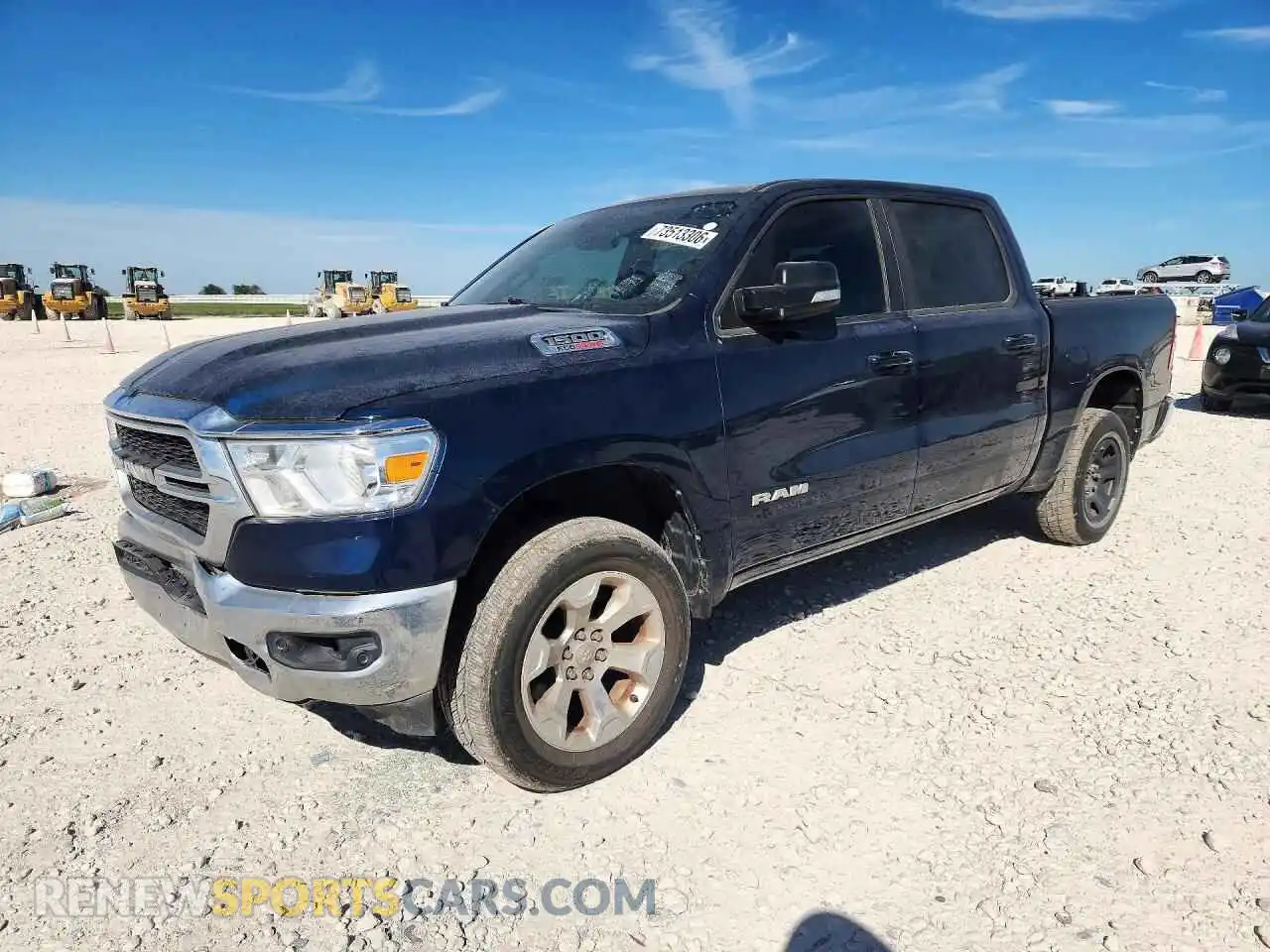 1 Photograph of a damaged car 1C6SRFFM7MN563459 RAM 1500 2021