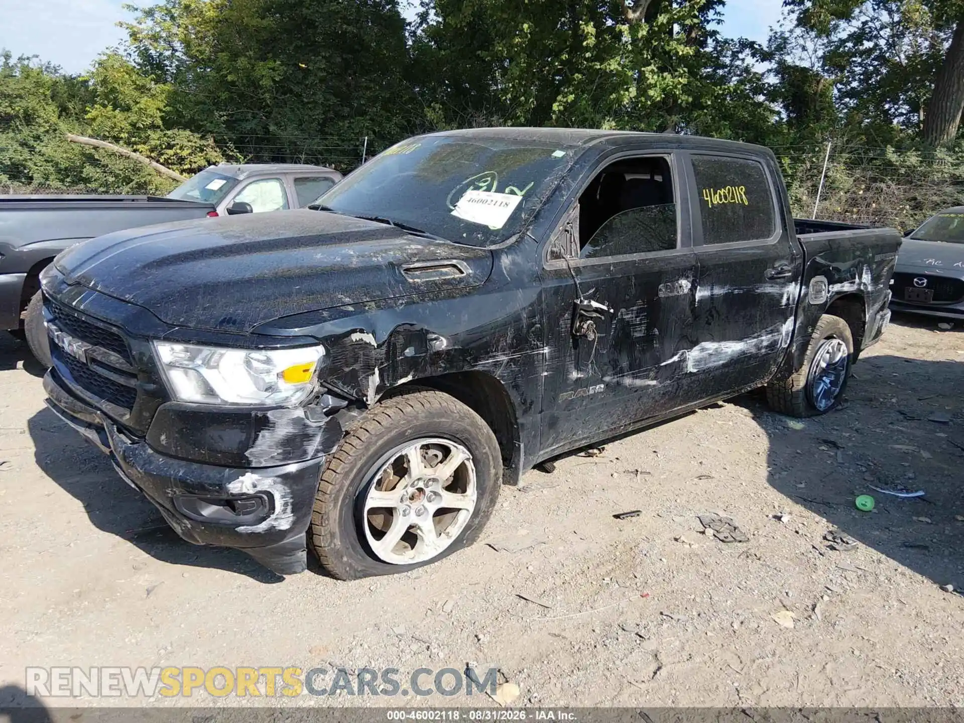 2 Photograph of a damaged car 1C6SRFFMXMN726833 RAM 1500 2021