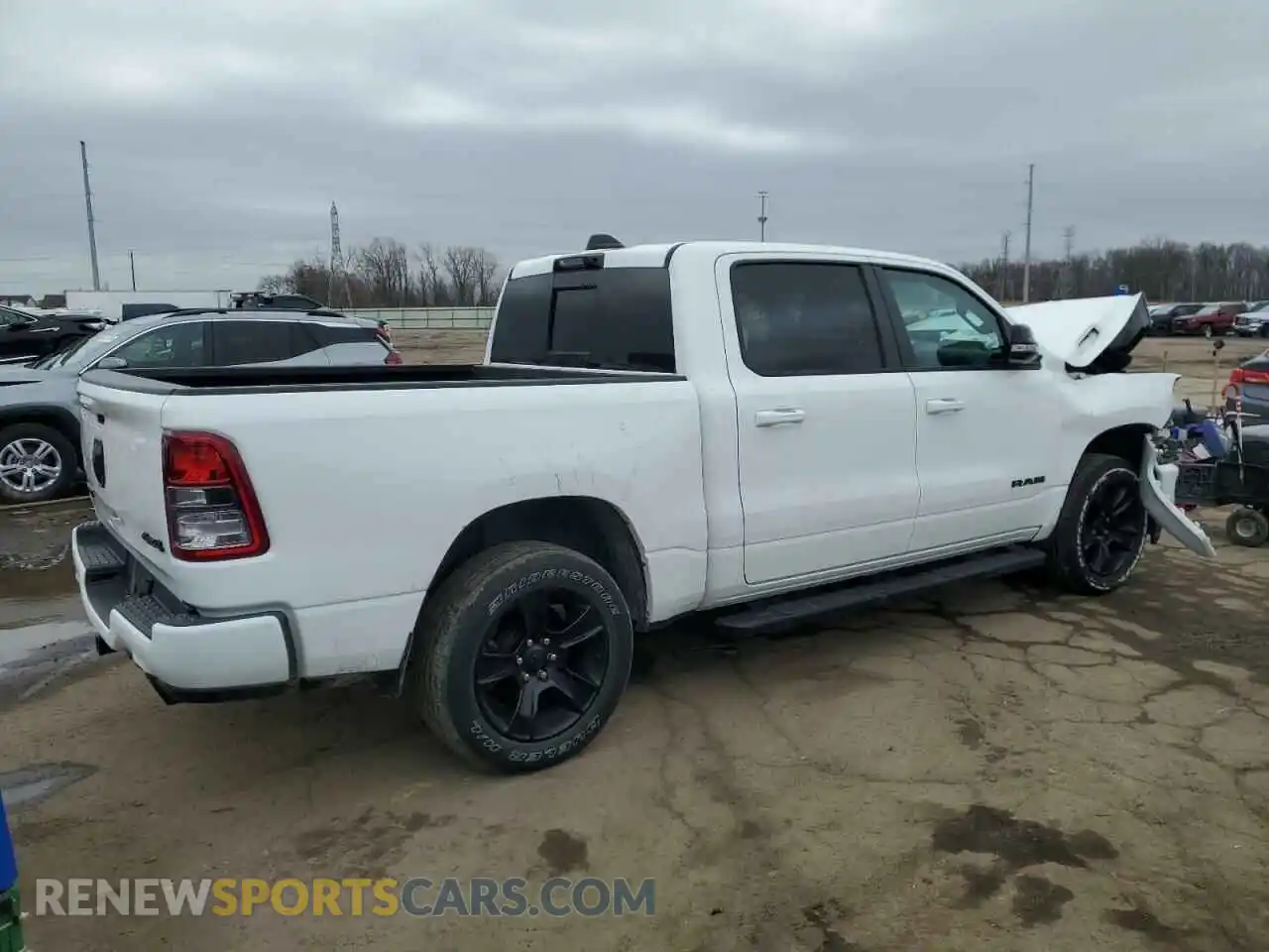 3 Photograph of a damaged car 1C6SRFFT0MN508939 RAM 1500 2021