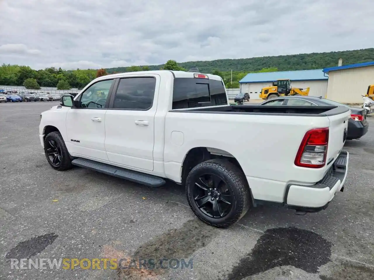 2 Photograph of a damaged car 1C6SRFFT0MN509413 RAM 1500 2021