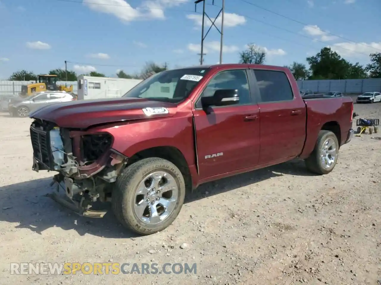 1 Photograph of a damaged car 1C6SRFFT0MN516572 RAM 1500 2021