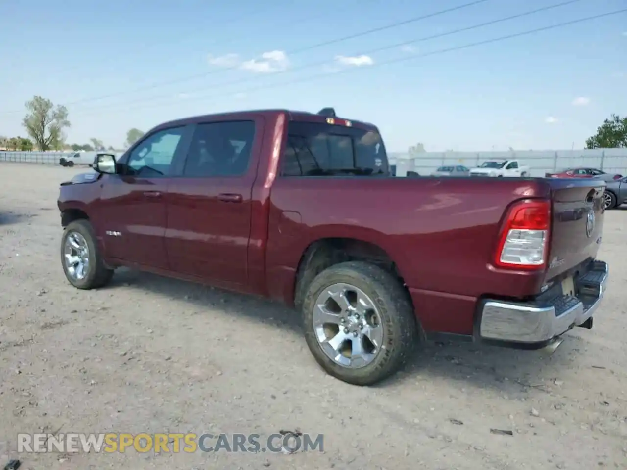 2 Photograph of a damaged car 1C6SRFFT0MN516572 RAM 1500 2021