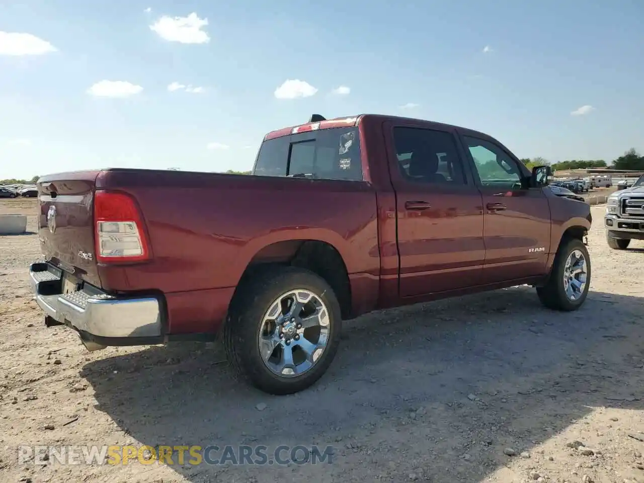 3 Photograph of a damaged car 1C6SRFFT0MN516572 RAM 1500 2021