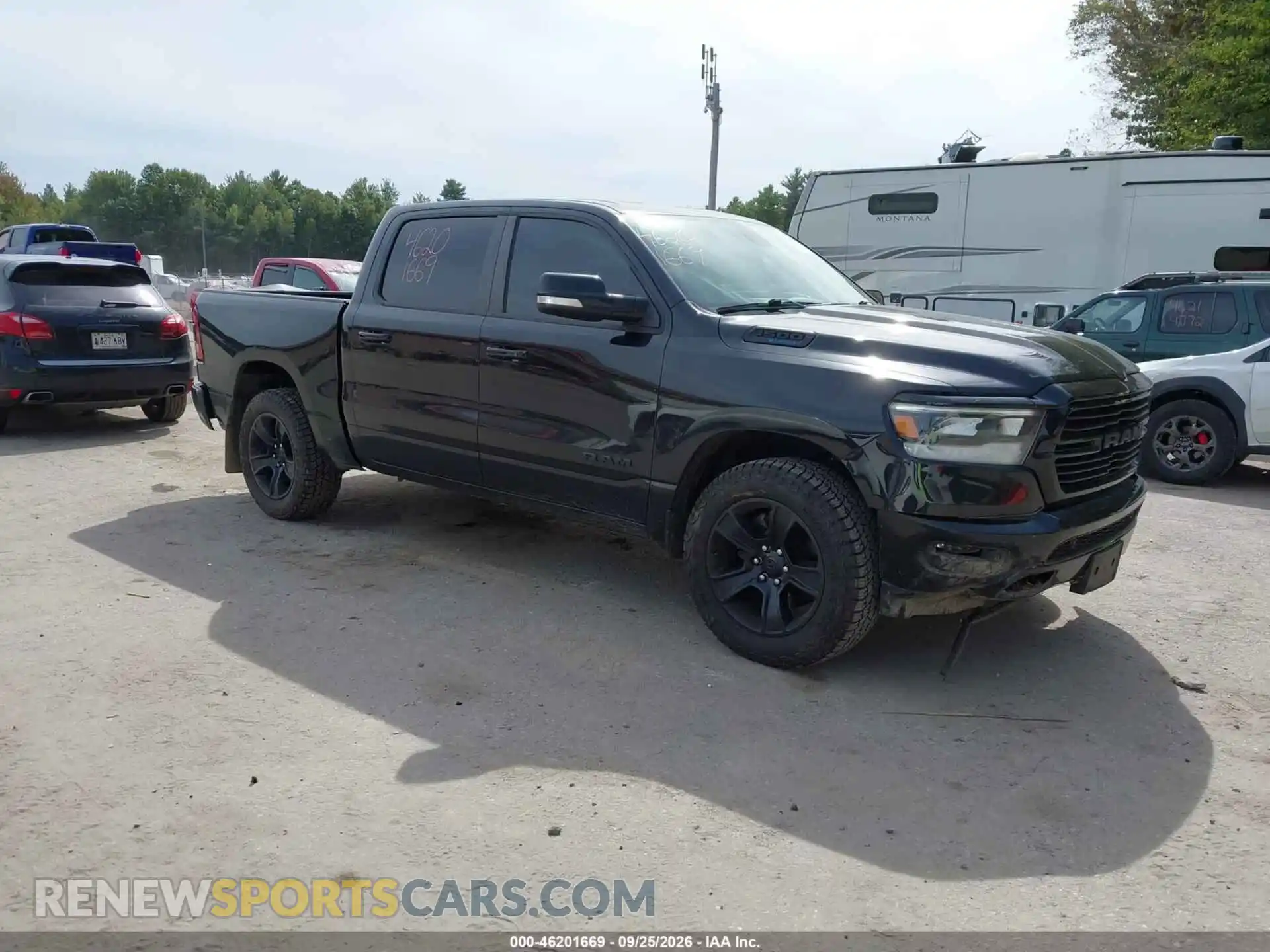1 Photograph of a damaged car 1C6SRFFT0MN546848 RAM 1500 2021