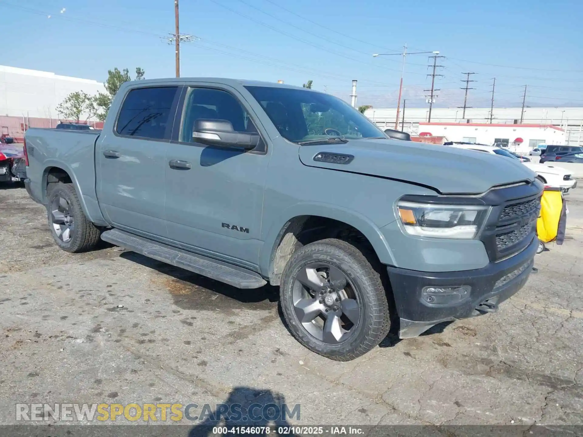 1 Photograph of a damaged car 1C6SRFFT0MN596990 RAM 1500 2021