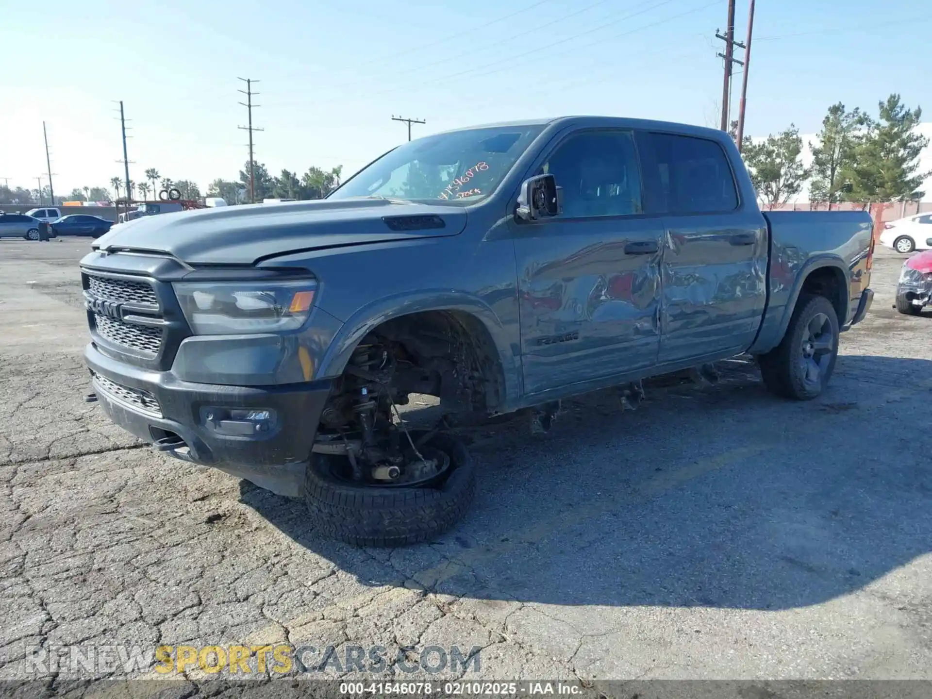 2 Photograph of a damaged car 1C6SRFFT0MN596990 RAM 1500 2021