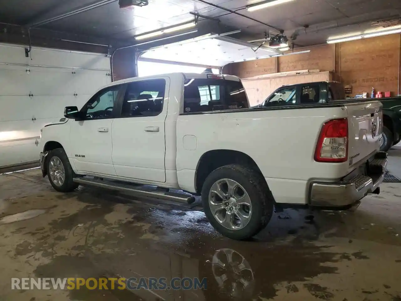 2 Photograph of a damaged car 1C6SRFFT0MN662146 RAM 1500 2021