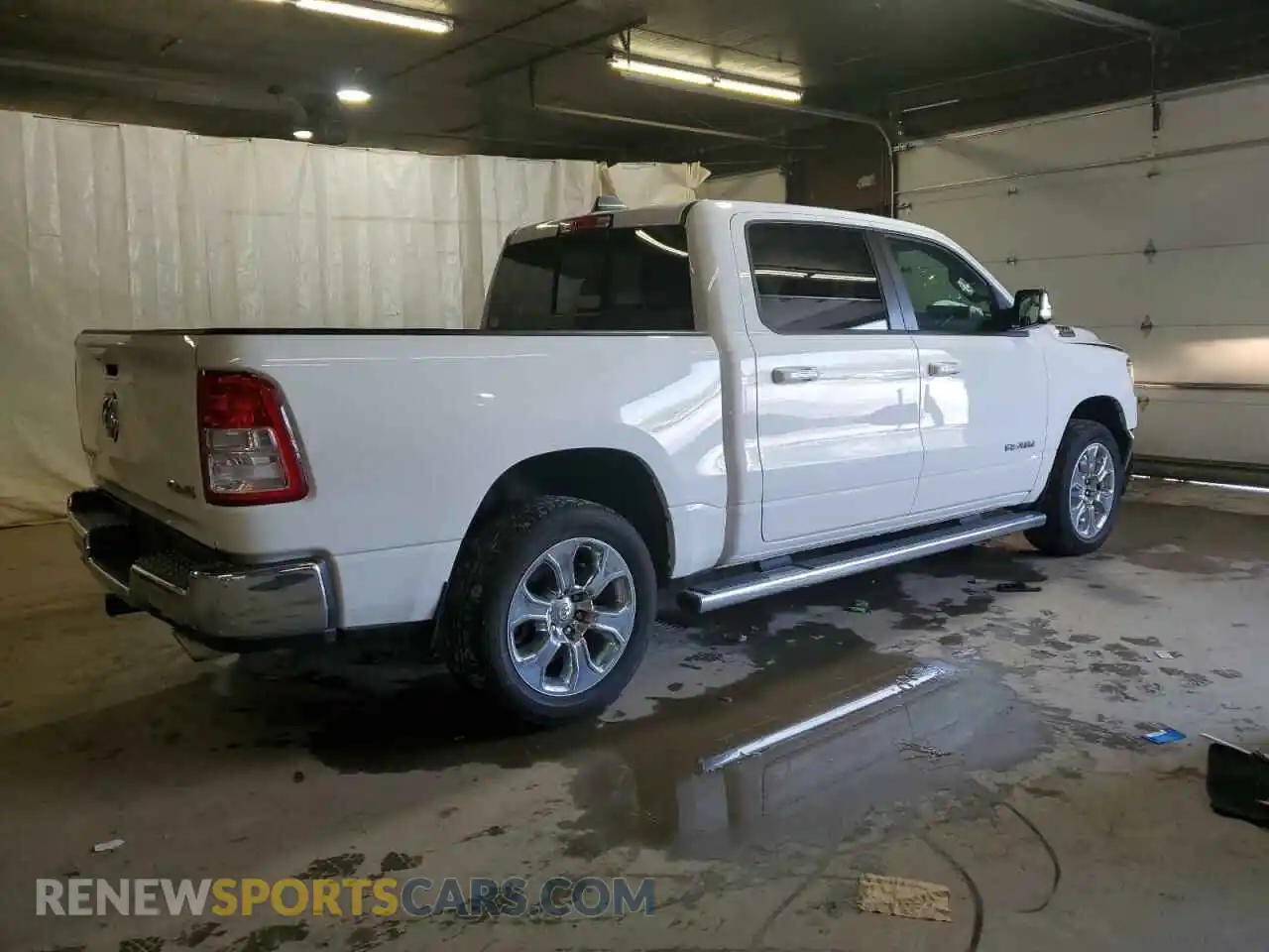 3 Photograph of a damaged car 1C6SRFFT0MN662146 RAM 1500 2021