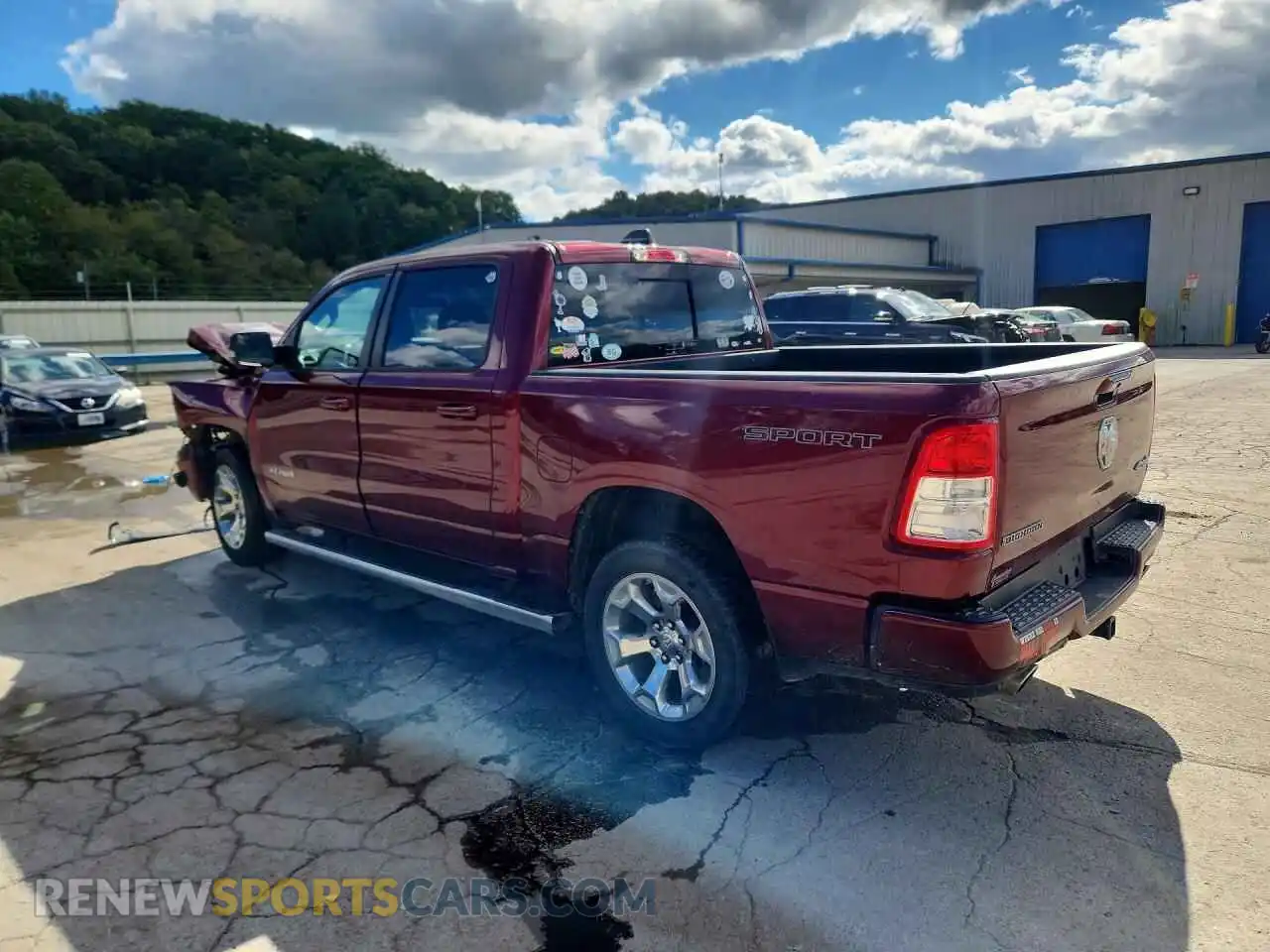 2 Photograph of a damaged car 1C6SRFFT0MN813941 RAM 1500 2021