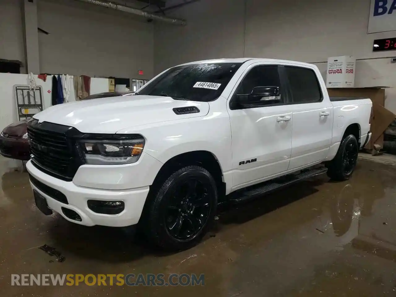1 Photograph of a damaged car 1C6SRFFT1MN506634 RAM 1500 2021