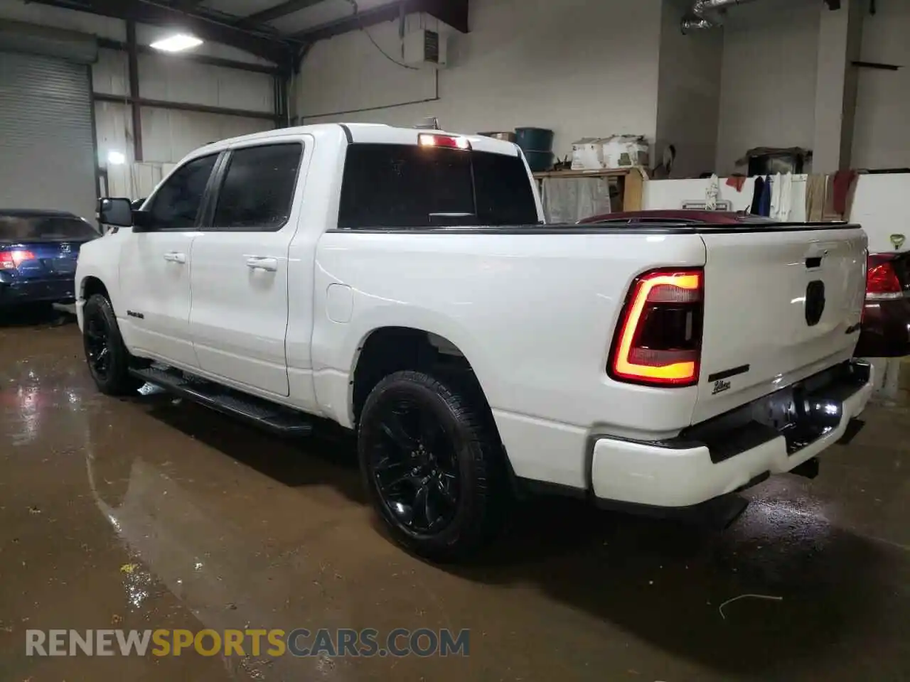 2 Photograph of a damaged car 1C6SRFFT1MN506634 RAM 1500 2021