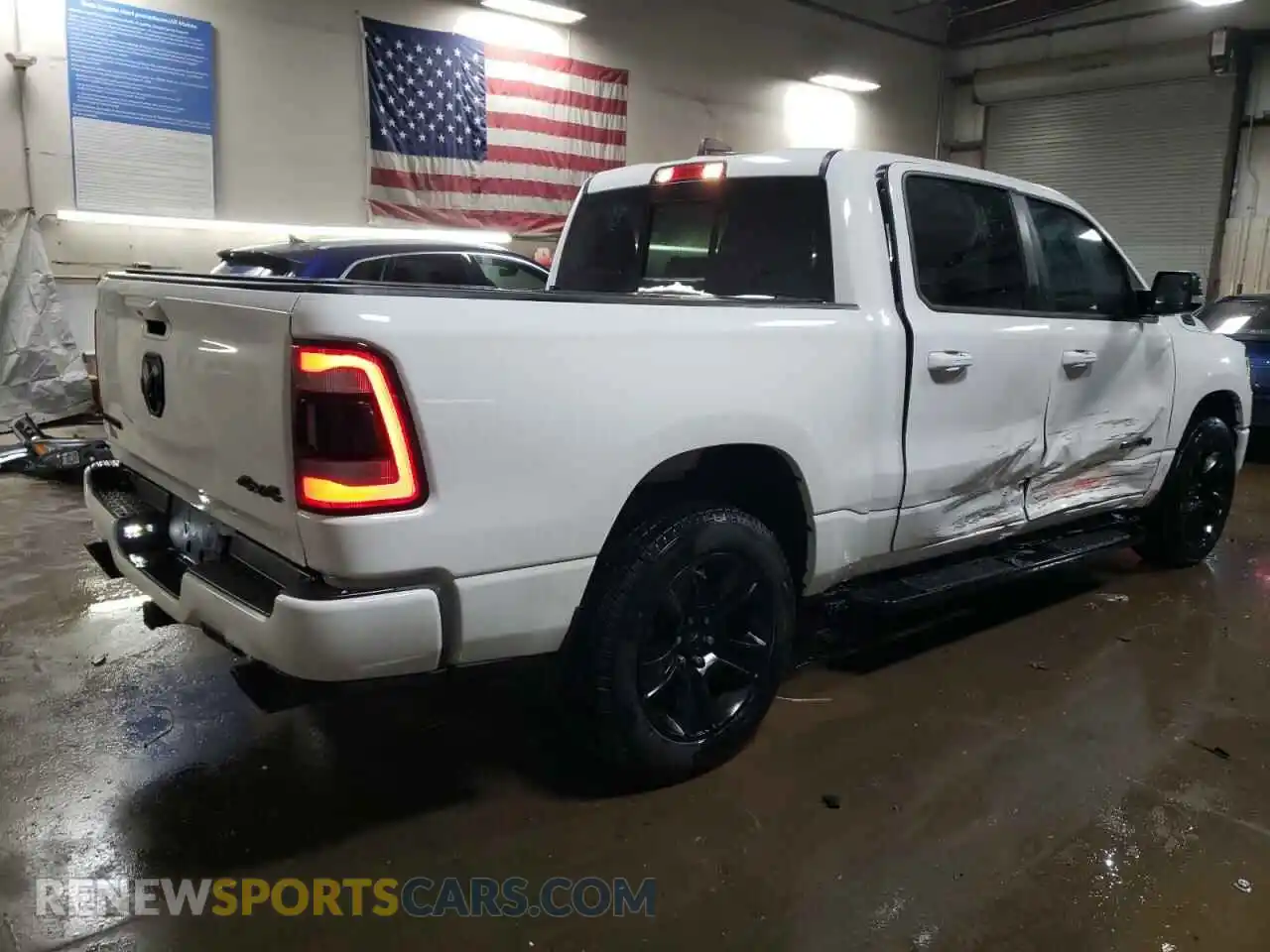 3 Photograph of a damaged car 1C6SRFFT1MN506634 RAM 1500 2021