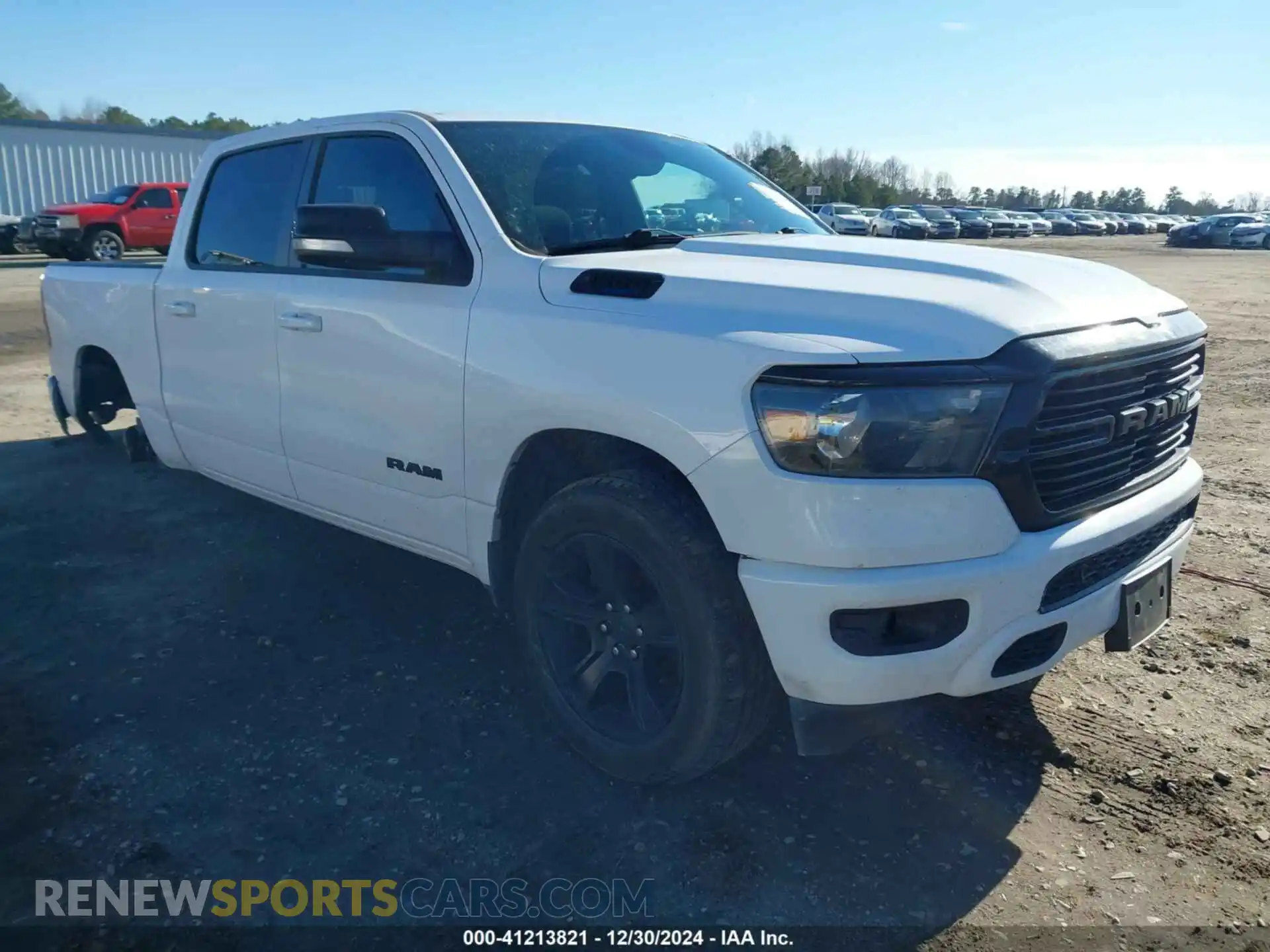 1 Photograph of a damaged car 1C6SRFFT1MN509467 RAM 1500 2021
