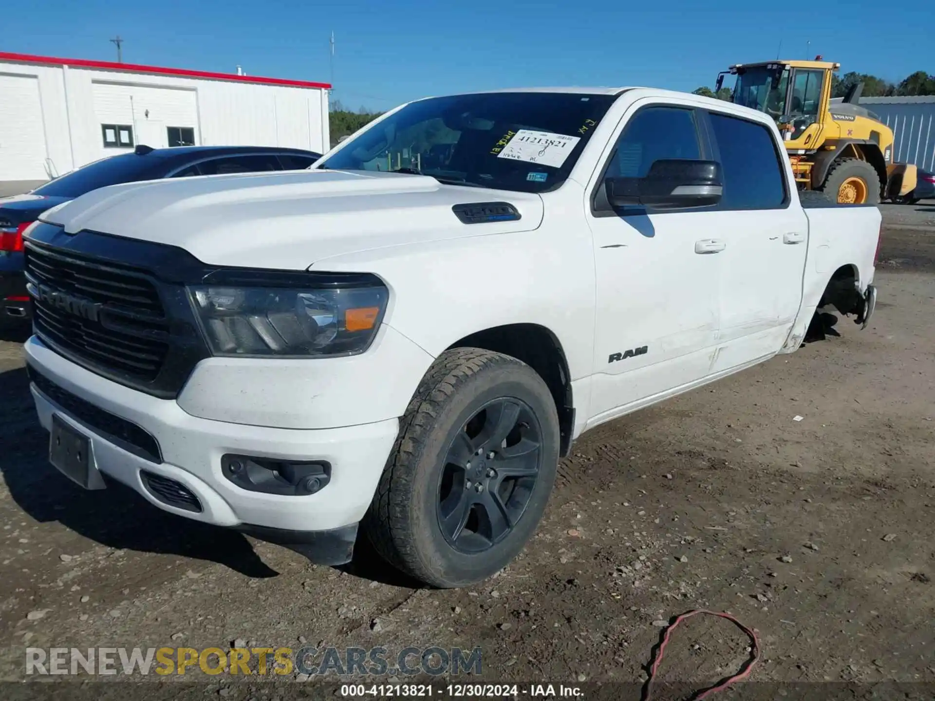 2 Photograph of a damaged car 1C6SRFFT1MN509467 RAM 1500 2021
