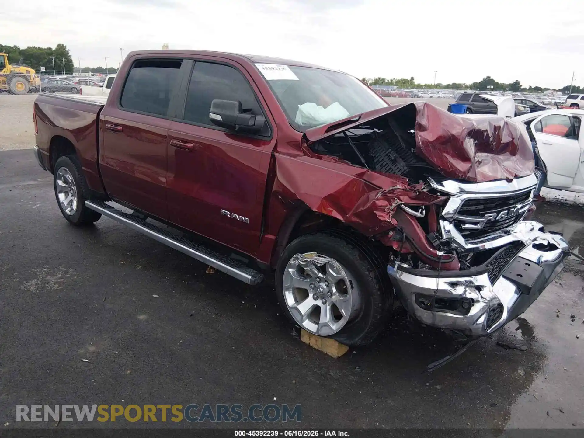 1 Photograph of a damaged car 1C6SRFFT1MN518234 RAM 1500 2021