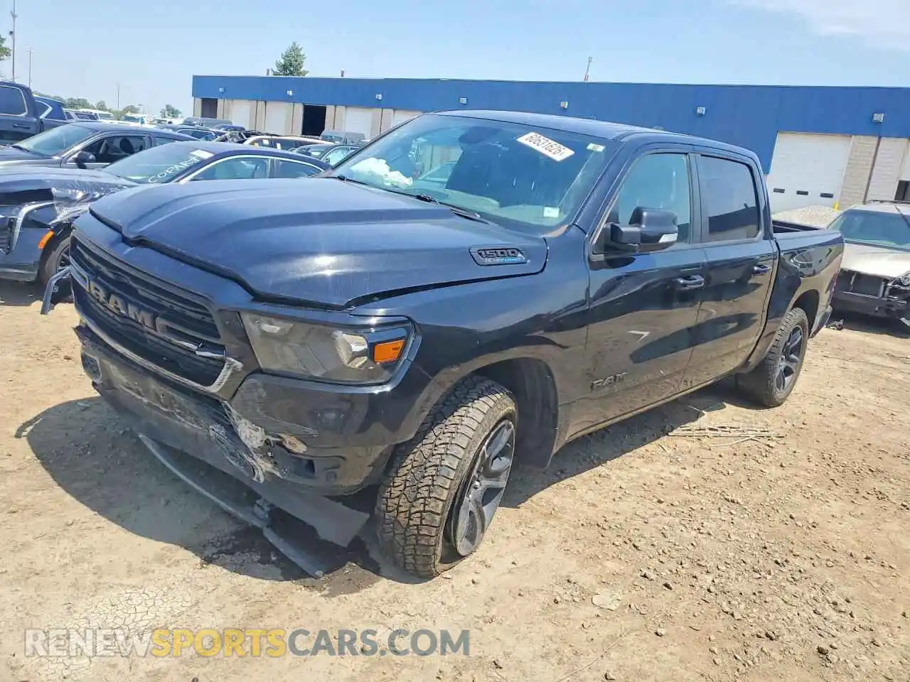 1 Photograph of a damaged car 1C6SRFFT1MN600884 RAM 1500 2021