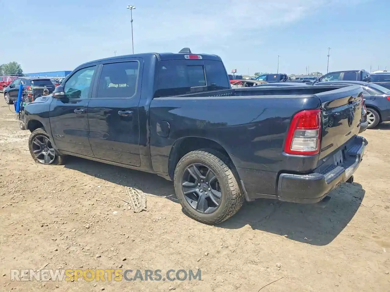 2 Photograph of a damaged car 1C6SRFFT1MN600884 RAM 1500 2021