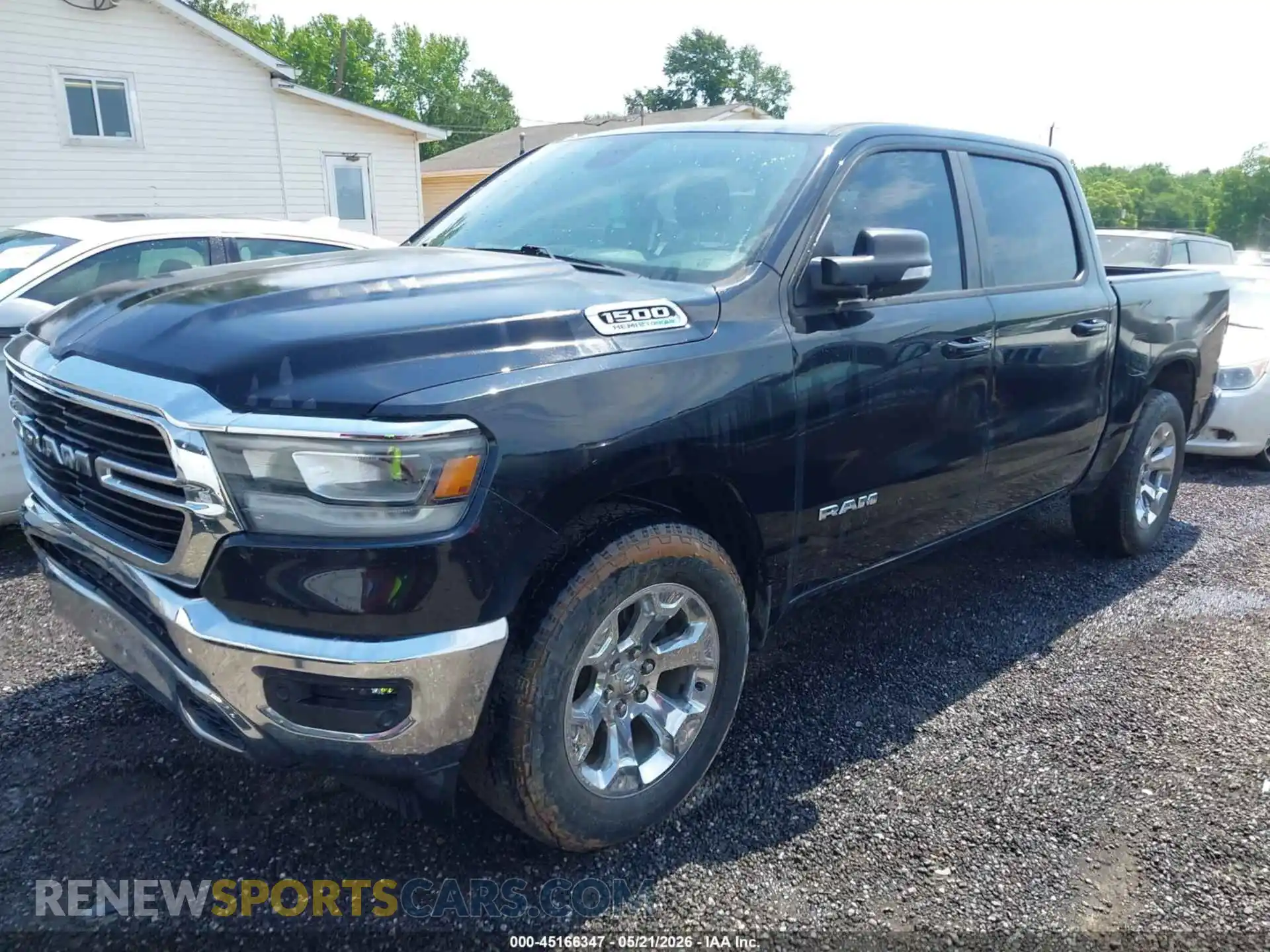 2 Photograph of a damaged car 1C6SRFFT1MN646327 RAM 1500 2021