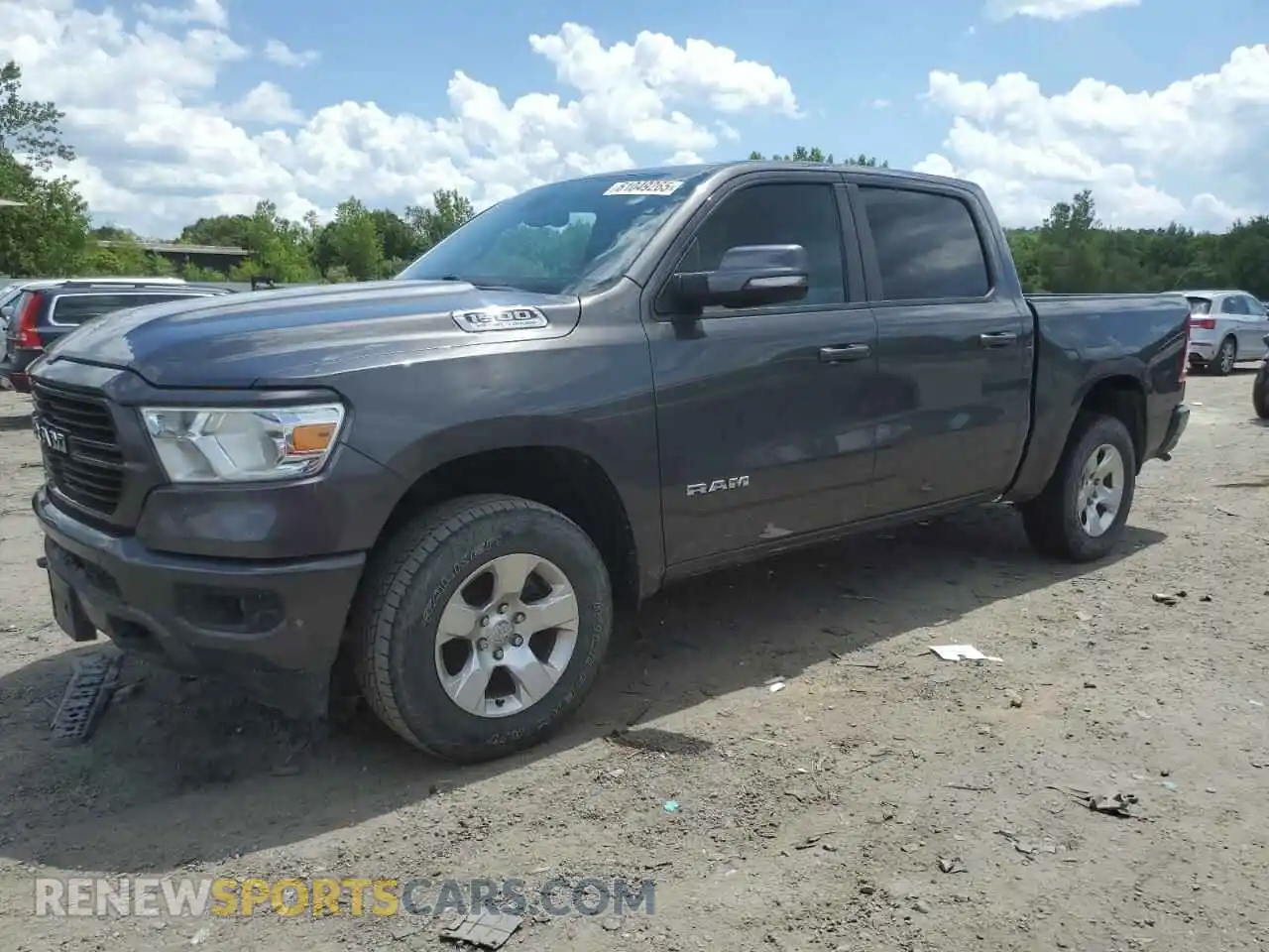 1 Photograph of a damaged car 1C6SRFFT1MN717722 RAM 1500 2021