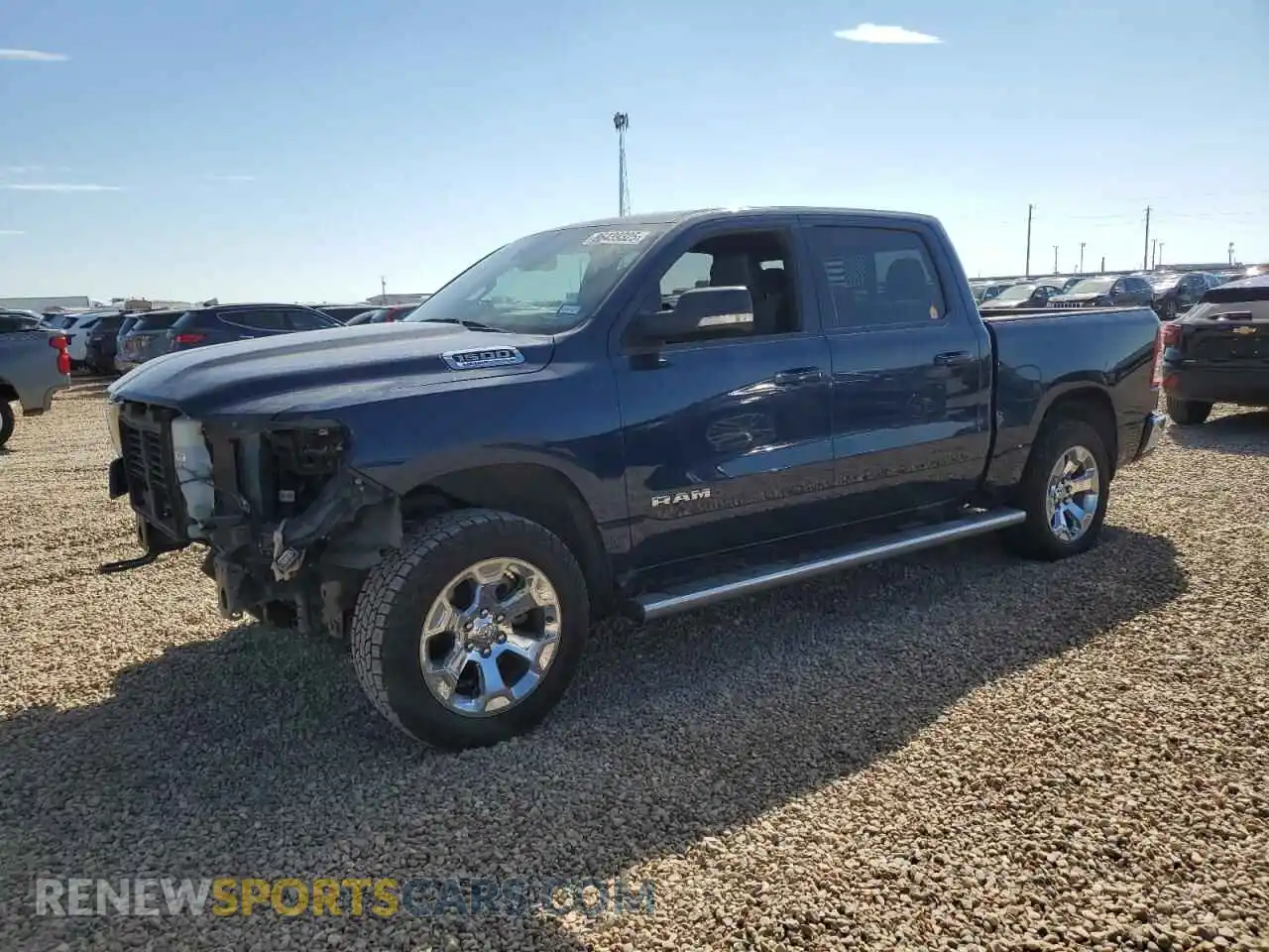1 Photograph of a damaged car 1C6SRFFT1MN745374 RAM 1500 2021