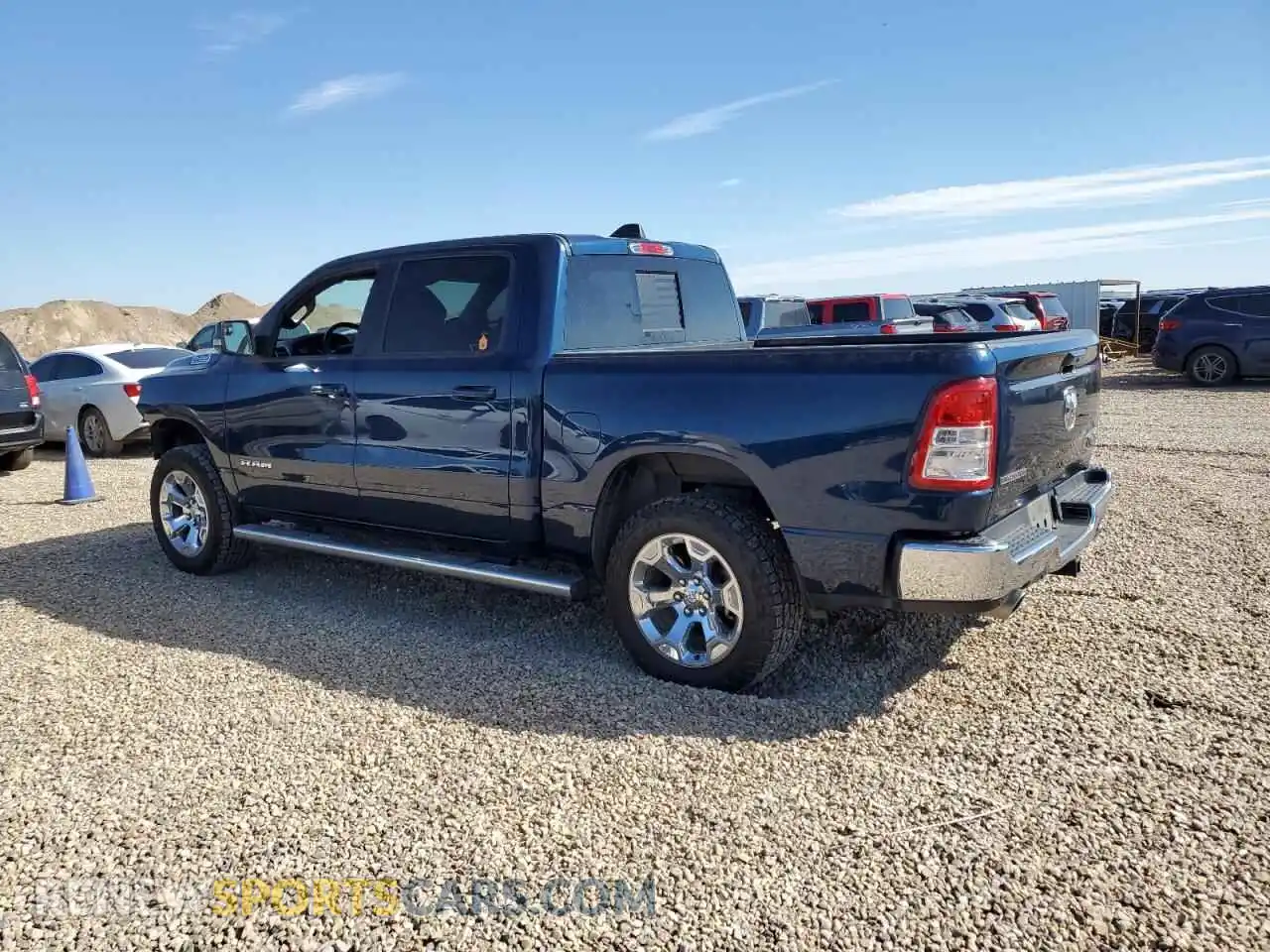2 Photograph of a damaged car 1C6SRFFT1MN745374 RAM 1500 2021