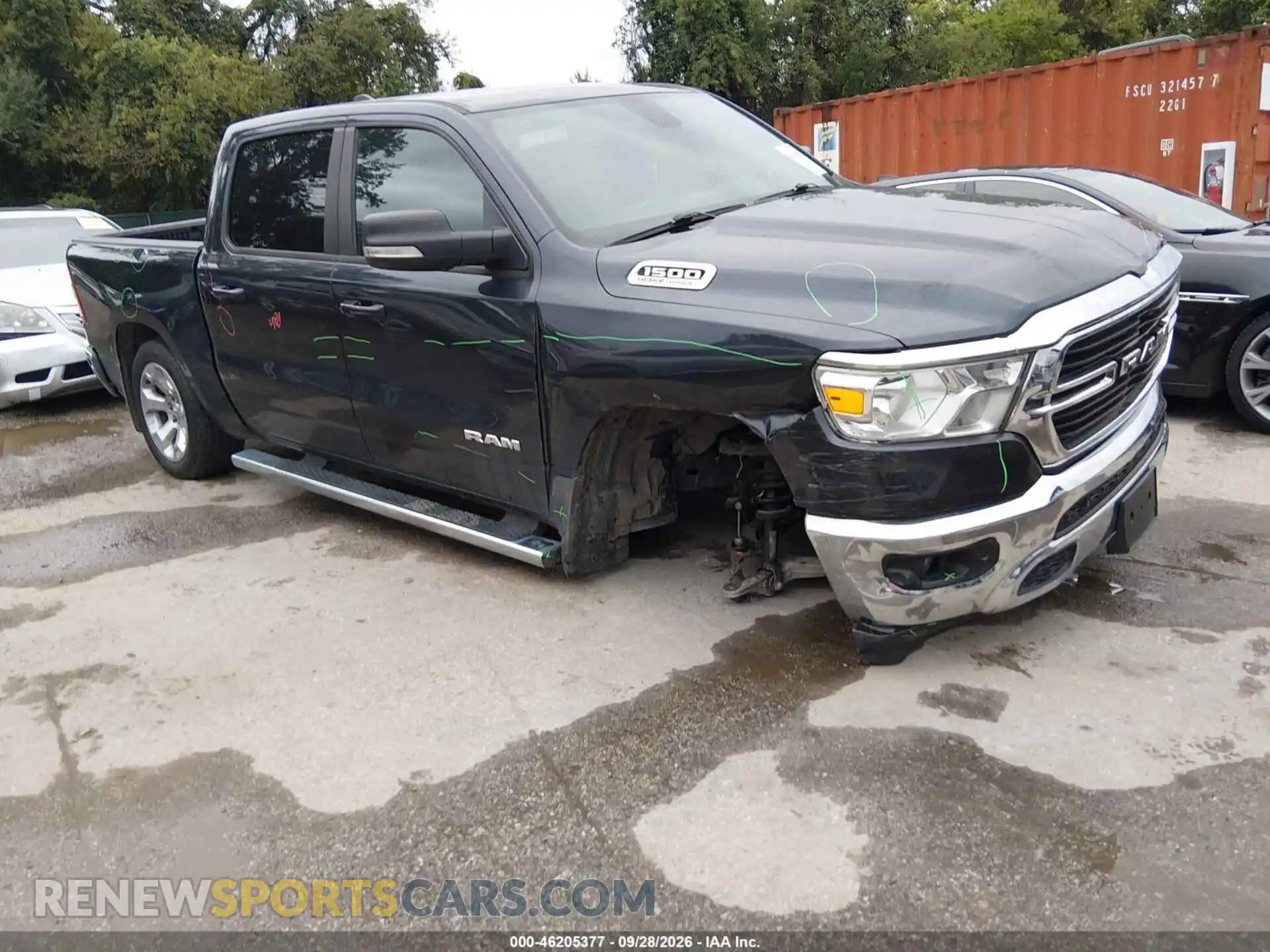 1 Photograph of a damaged car 1C6SRFFT1MN797166 RAM 1500 2021